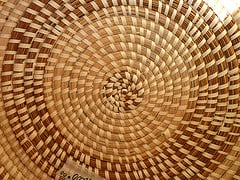 Spiral pattern on the bottom of a basket. Photo Creative Commons licensed by Muffet.