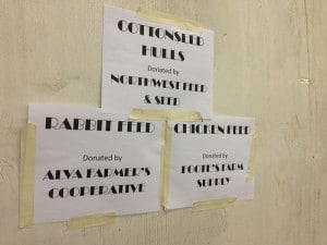 Signs recognize local business donors at the county fair. Photo by Becky McCray. 