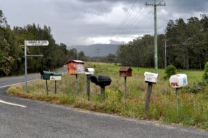 Row of rural mailboxes. Photo by Glen Wright on Flickr.