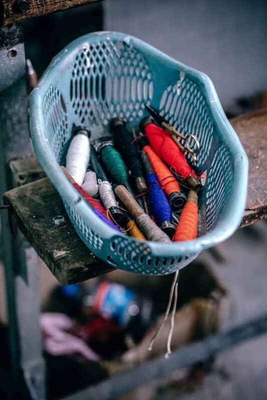 Basket of sewing tools and thread