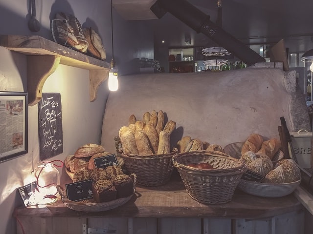 Baskets of bread in a rustic kitchen